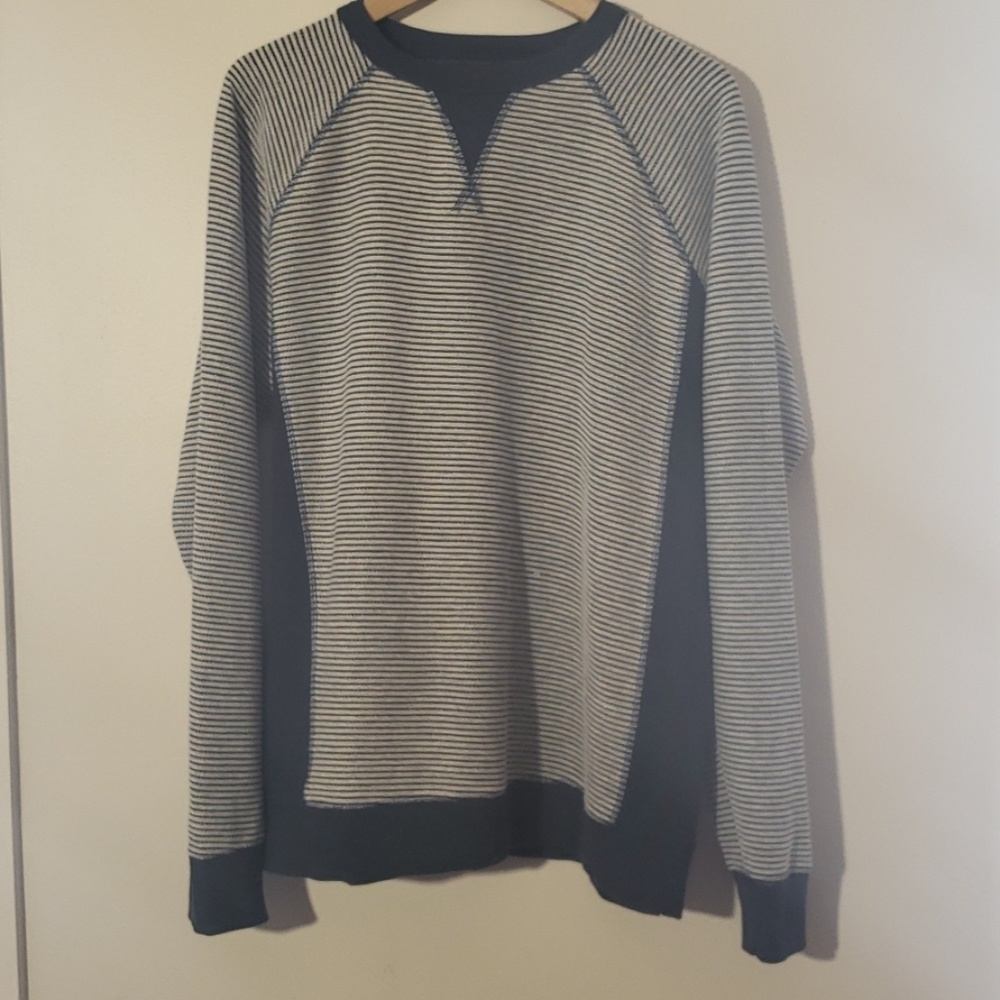 solid and striped sweater